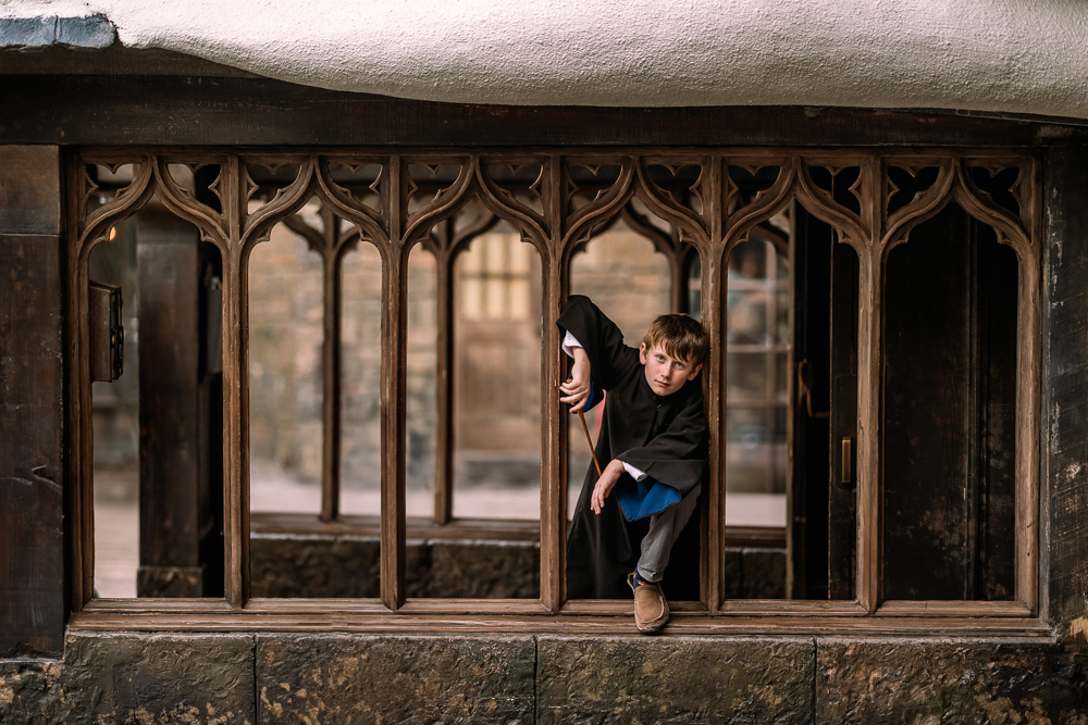 Orlando family photographer Natalie Szolomayer captures son Alfie as a Ravenclaw wizard at Universal Studios Orlando Wizarding World