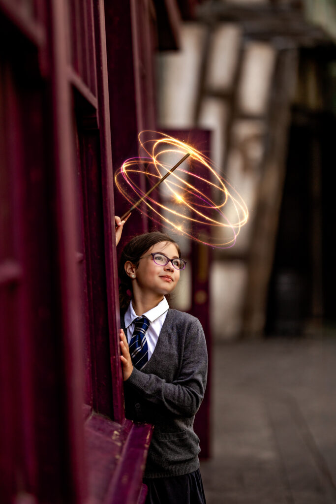 Young witch casts her spell in the Wizarding World at Universal Orlando Resort