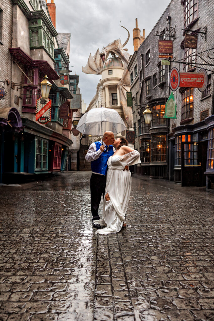 Couple kissing in rainy Diagon Alley with Gringotts dragon overhead