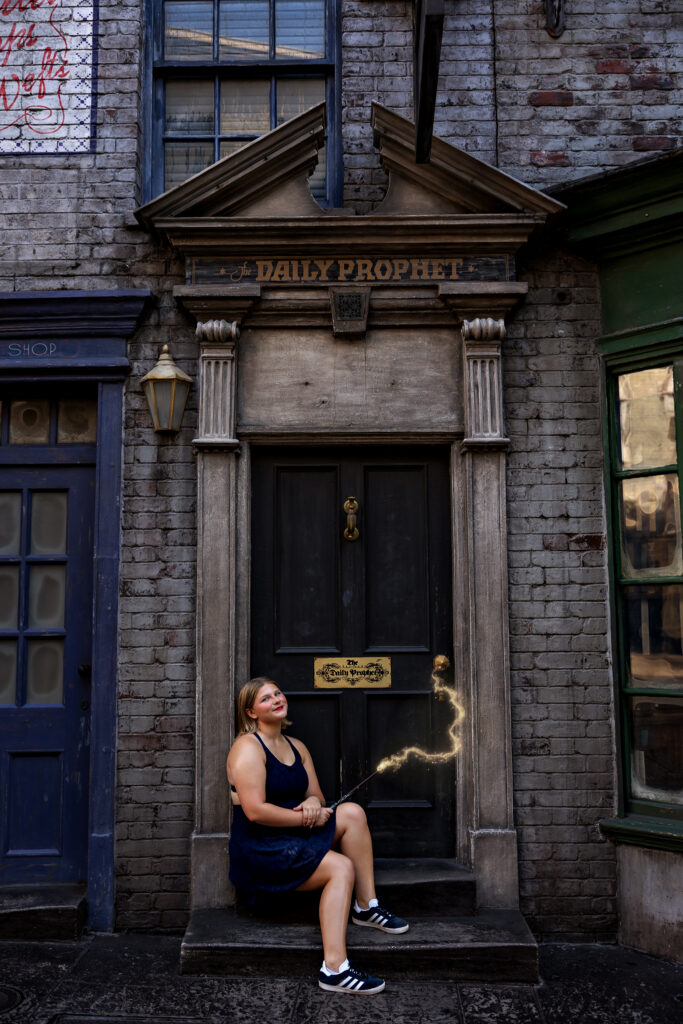 Jayda sits at the doorway of the Daily Prophet