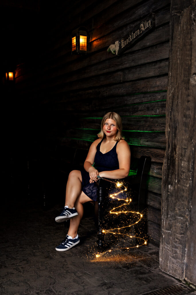 Jayda sits at the entrance of knockturn alley