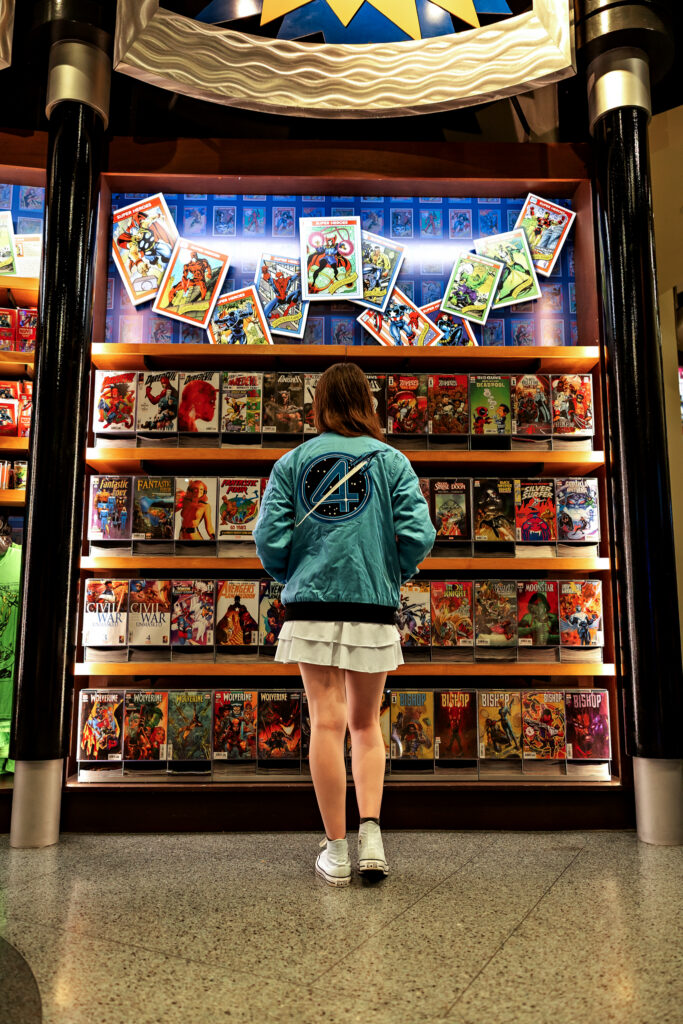 Madison, look at the rows of comic books inside the store at Marvel Super Hero Island